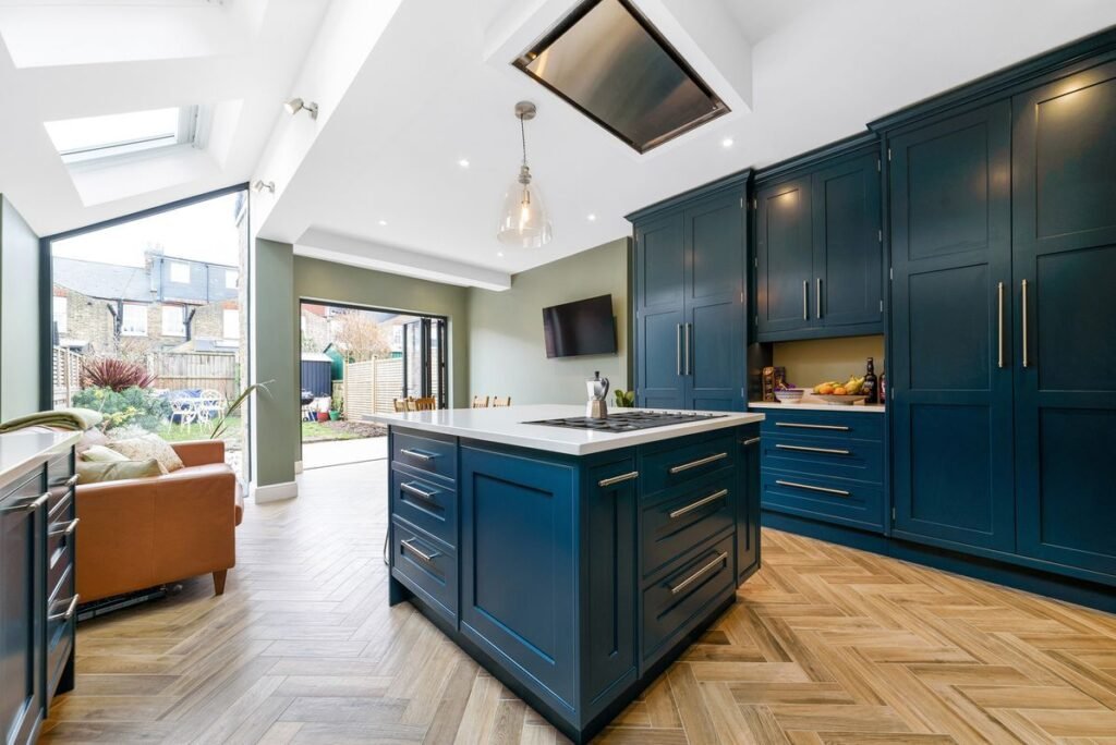 Modern kitchen fitting in London by J.J Roofing & Construction Ltd