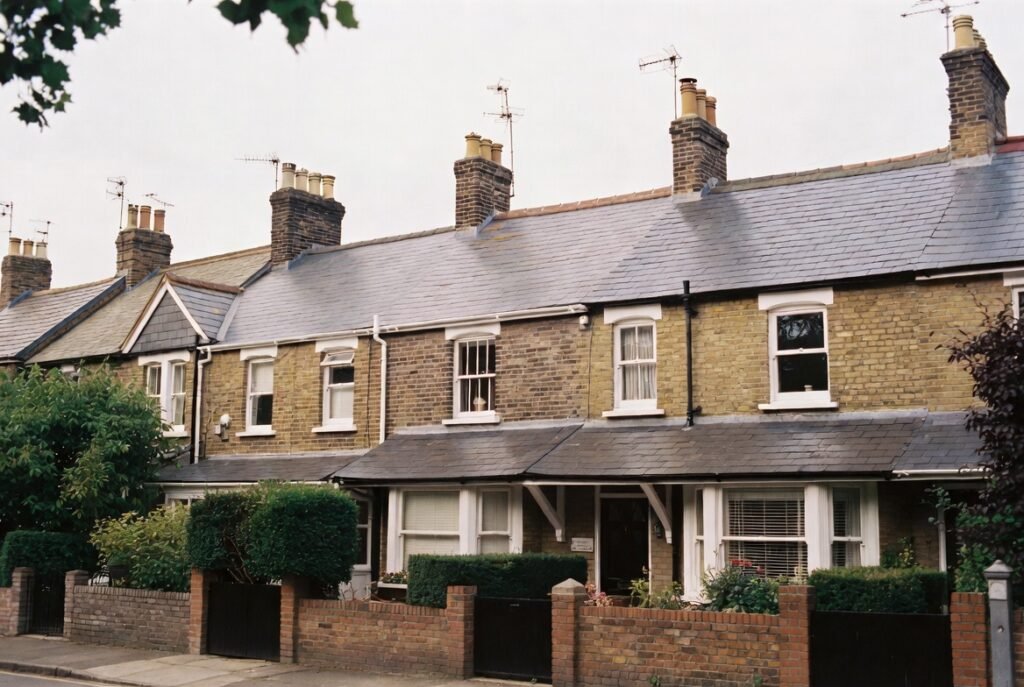 Roofer Twickenham inspecting a TW1 pitched roof near the riverside