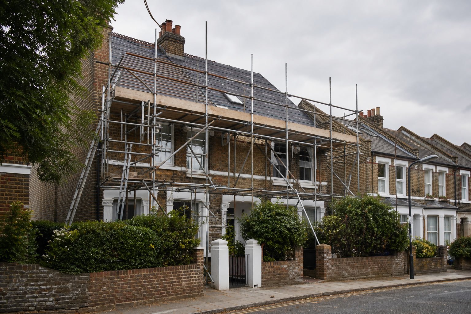 new roof cost Chiswick scaffold against a W4 terrace roof