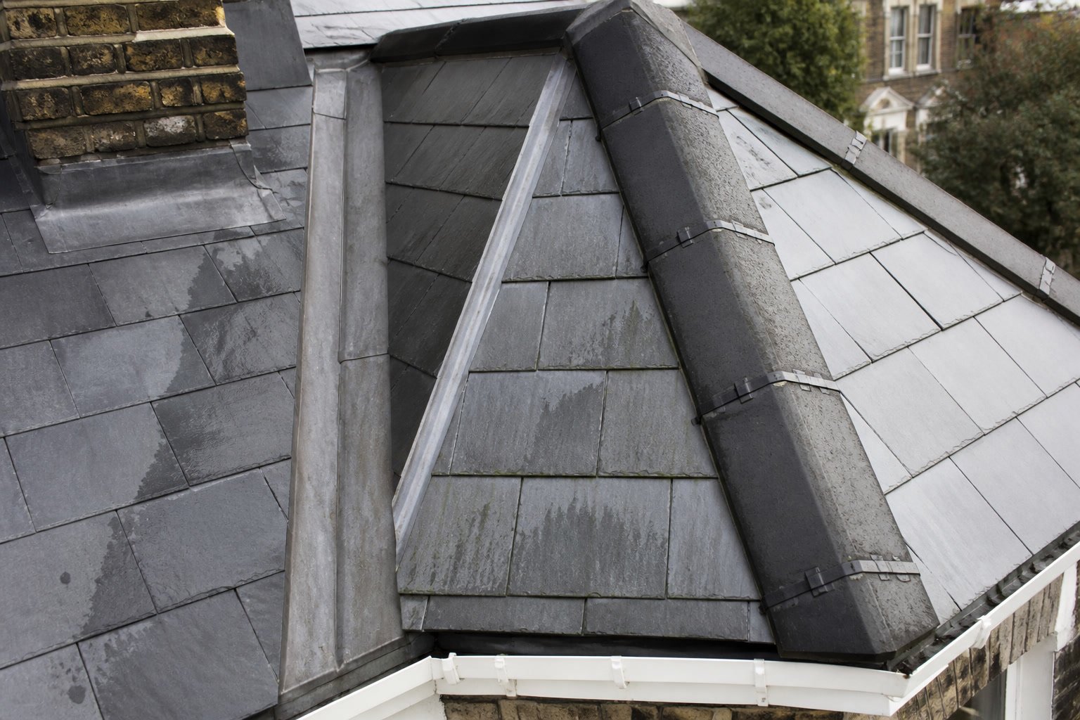 slate vs tile roof Chiswick close-up of period slate ridge and valley